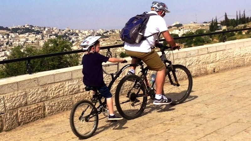 Experience Israel on a bike. Israel bike tours for individuals, couples, families and group travelers, with local private guides. Biking and bicycle tours in Israel. Cycling in Israel. Biking and cycling tours of Israel. Bike across the Negev desert, Jerusalem, Holy land, Galilee, Golan Heights, Tel Aviv, Beer sheva, Beersheba, Dead Sea, Negev desert, Mitzpe Ramon, Ramon crater, Massada, Masada, Sde Boker, and Eilat. Take a night bike tour of Jerusalem. Take a bike tour through Israel's wineries and vineyards  |  IsraelTravelCompany.com